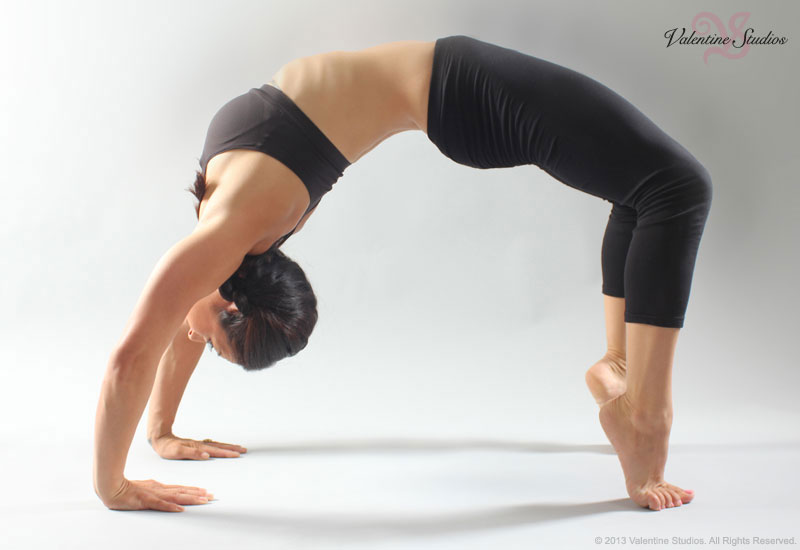 Horse racing jockey Kayla Stra poses for her Santa Anita Hot Yoga Studio advertising photos.